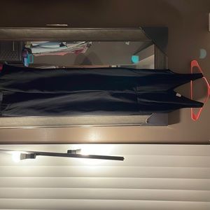 A new day black pant suit. Comes with black belt to tie around waist. Size small